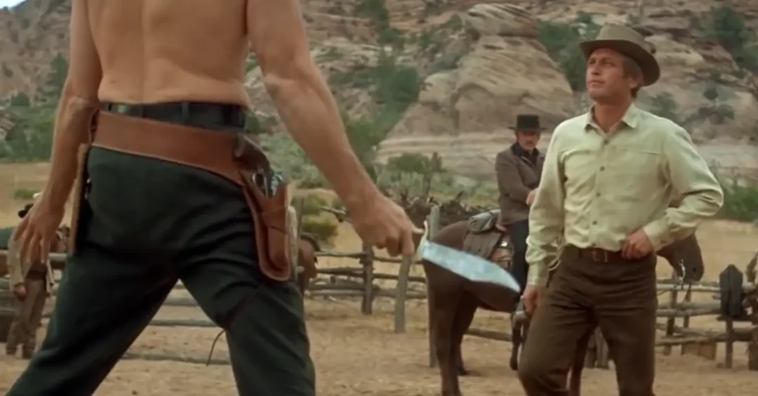 Butch discute con un miembro de su banda quien debe ser el jefe