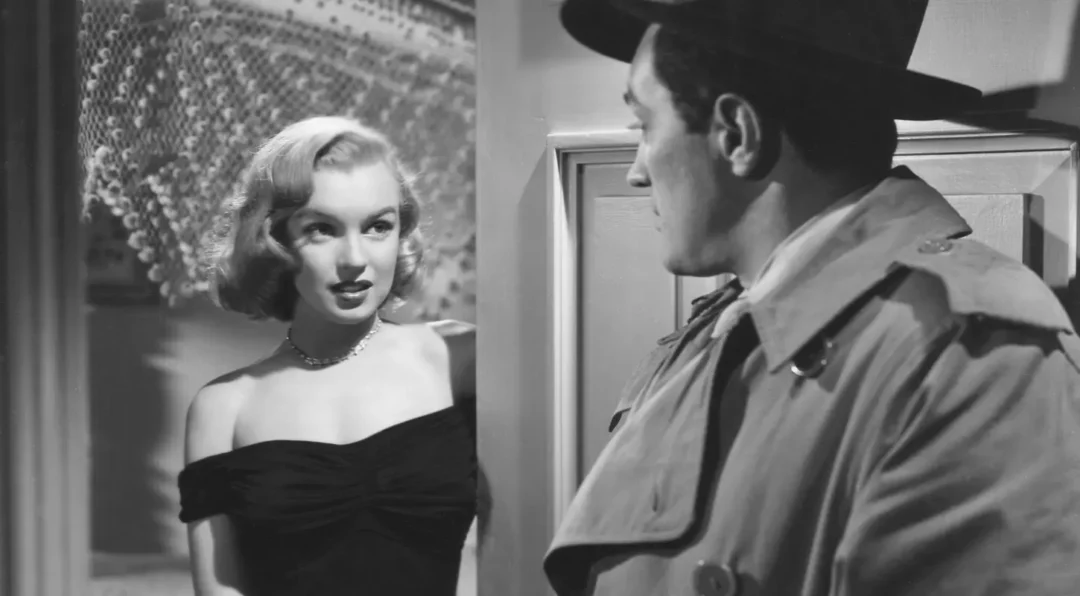 Marilyn Monroe y Anthony Caruso en La jungla de asfalto (1950)