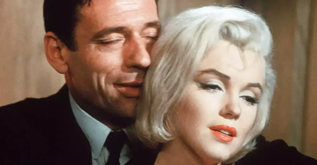 Yves Montand con Marilyn en una escena de El Multimillonario