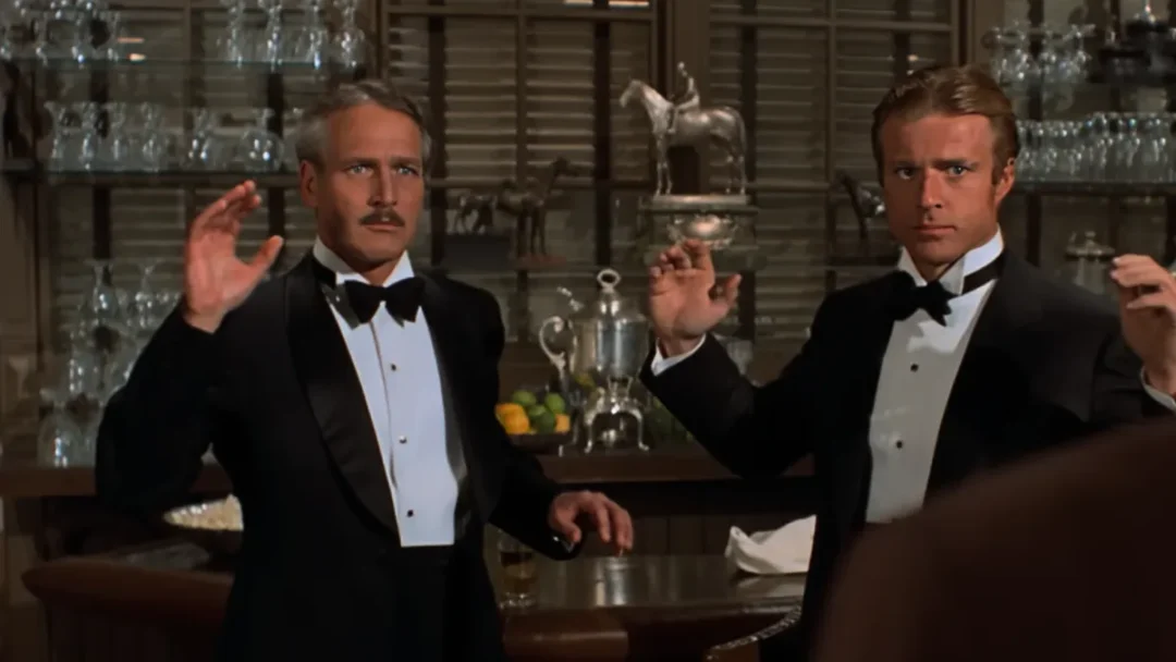 Newman interpreta a Henry Gondorff y Redford a Johnny Hooker en El golpe
