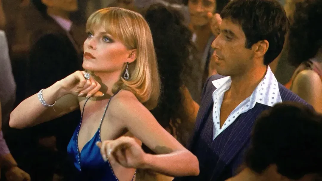 Elvira Hancock interpretada por Michelle Pfeiffer con Tony Montana (Al Pacino)