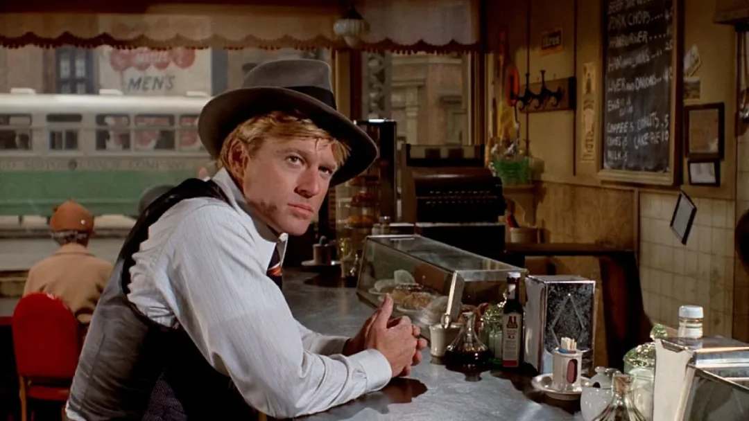 Robert Redford interpreta a Johnny Hooker