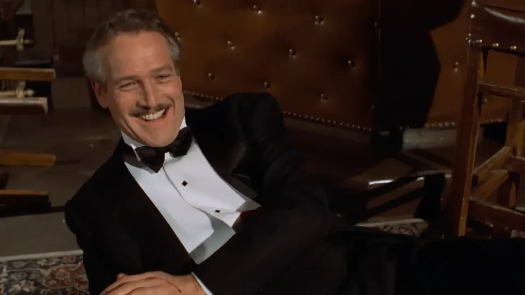 Paul Newman es Henry Gondorff